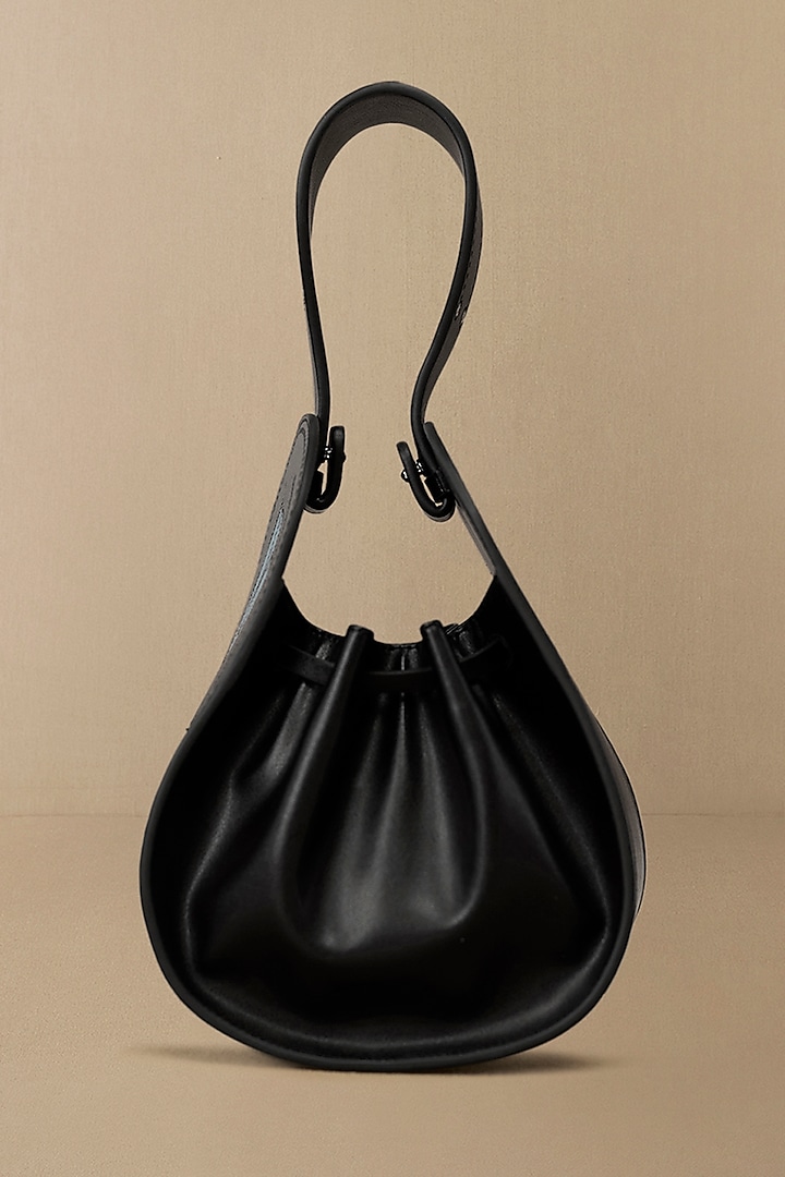 Black Faux Leather Wristlet Bag by AMPM Accessories at Pernia's Pop Up Shop