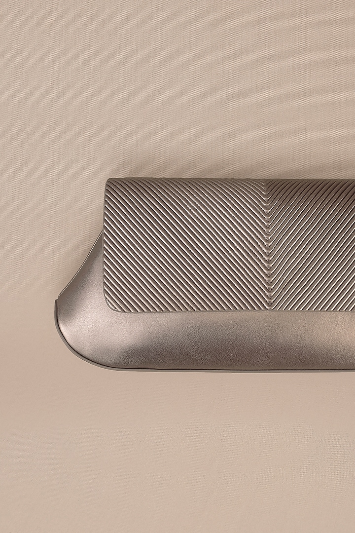 Metallic Faux Leather Corded Clutch by AMPM Accessories at Pernia's Pop Up Shop