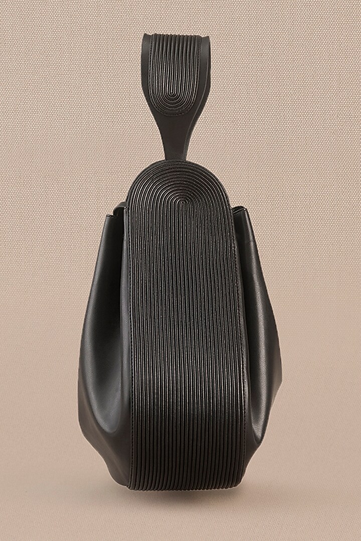 Black Faux Leather Corded Bucket Bag by AMPM Accessories at Pernia's Pop Up Shop