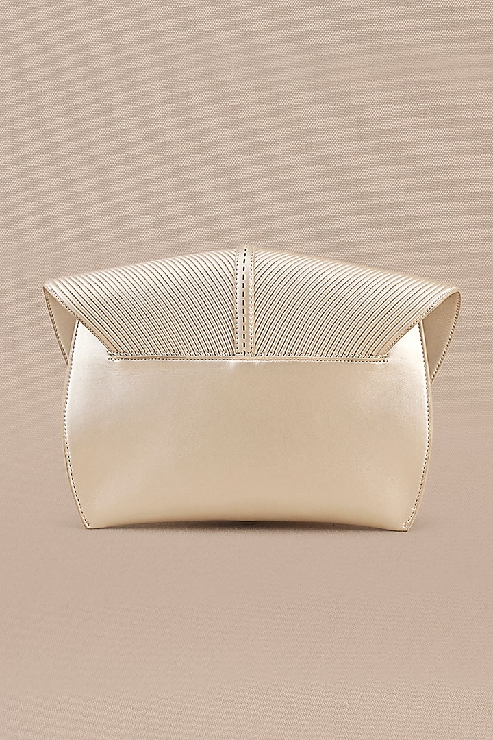 White Faux Leather Metallic Clutch by AMPM Accessories at Pernia's Pop Up Shop