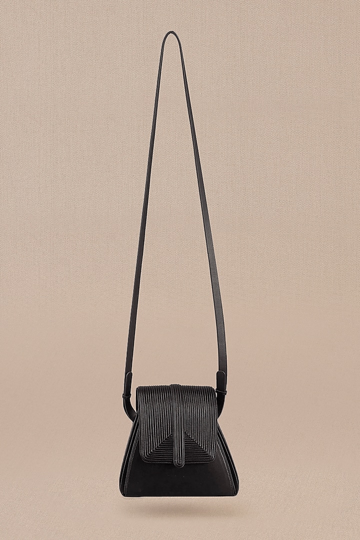 Black Faux Leather Cord Embroidered Sling Bag by AMPM Accessories at Pernia's Pop Up Shop