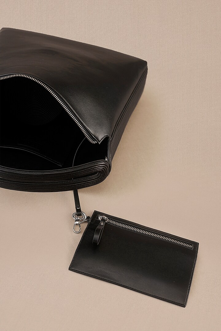 Black Faux Leather Corded Tote Bag  by AMPM Accessories at Pernia's Pop Up Shop