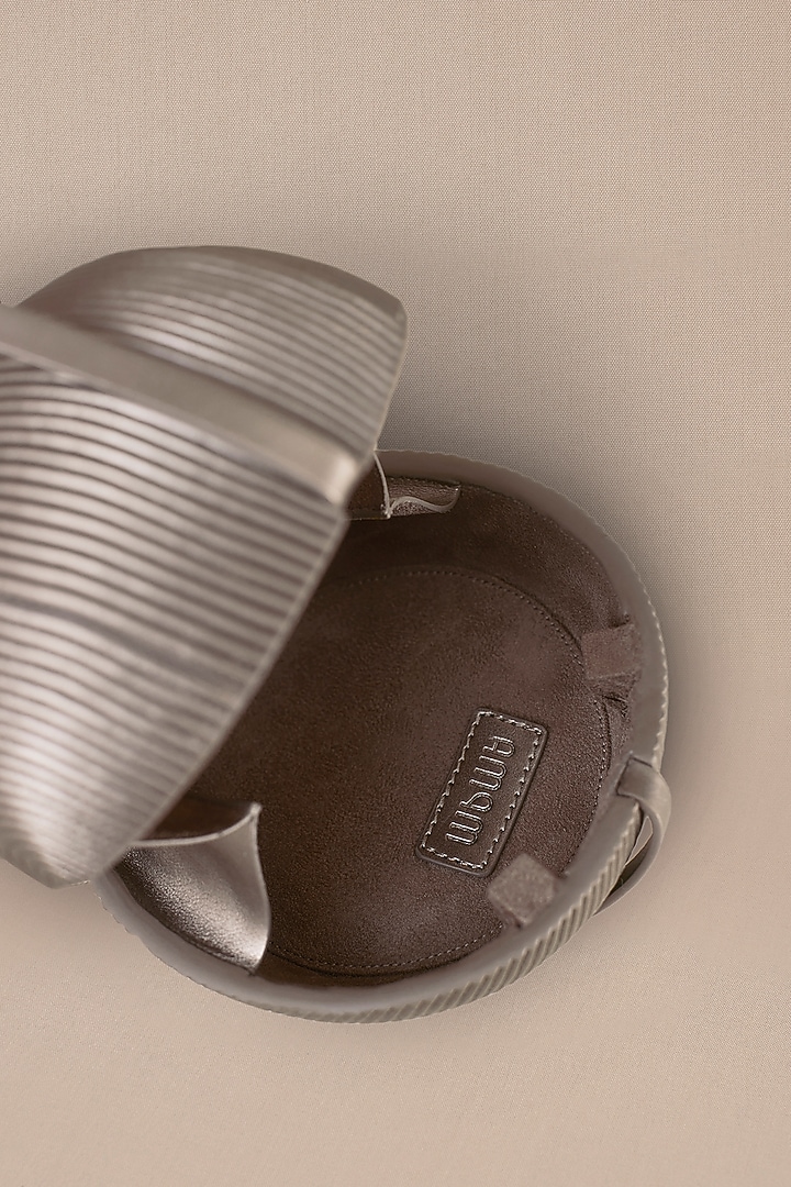 Metallic Faux Leather Toosh by AMPM Accessories at Pernia's Pop Up Shop