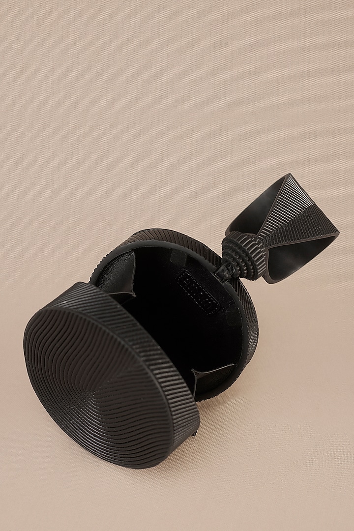 Black Faux Leather Wristlet by AMPM Accessories at Pernia's Pop Up Shop