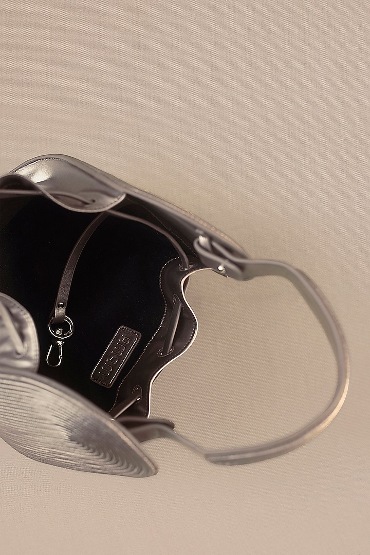 Metallic Faux Leather Corded Bucket Bag by AMPM Accessories at Pernia's Pop Up Shop