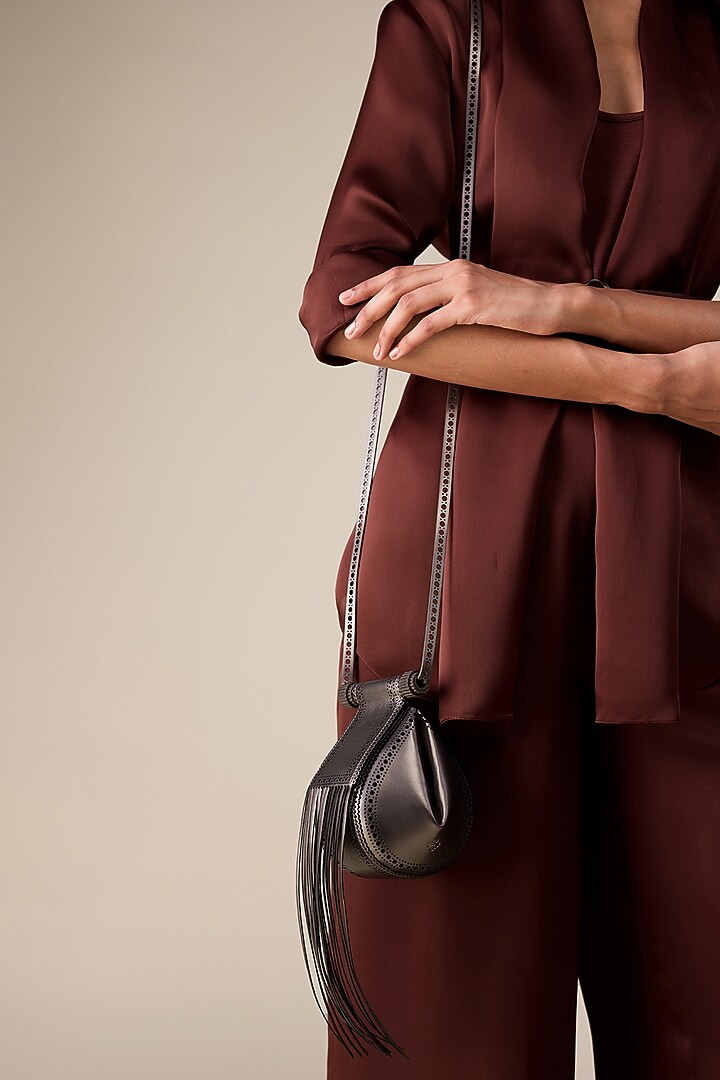 Metallic Toosh Faux Leather Sling Bag by AMPM Accessories at Pernia's Pop Up Shop