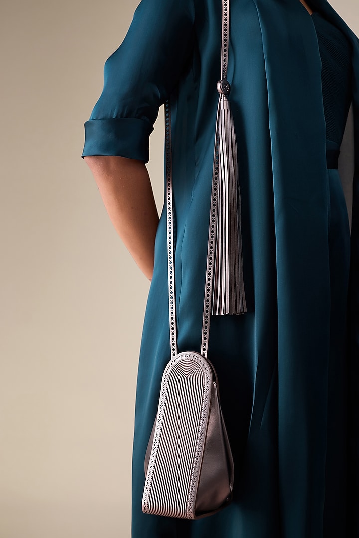 Metallic Toosh Faux Leather Sling Bag by AMPM Accessories at Pernia's Pop Up Shop