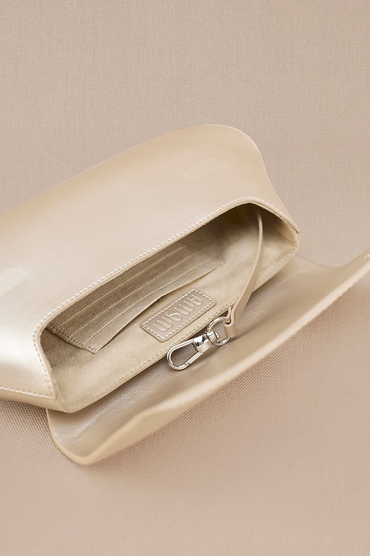 Metallic Pearl White Faux Leather Clutch by AMPM Accessories at Pernia's Pop Up Shop