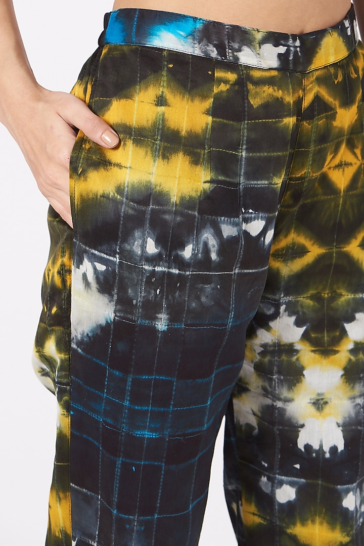 Black Shibori Tapered Trousers by Amrich at Pernia's Pop Up Shop