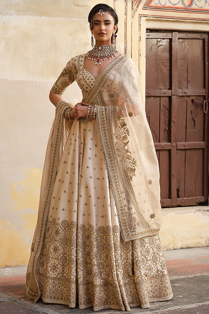 Ivory Raw Silk Zardosi Embellished Bridal Lehenga Set by AMRIN KHAN at Pernia's Pop Up Shop