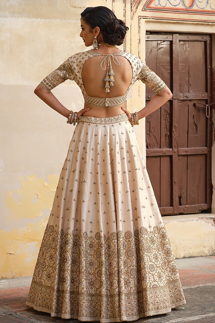 Ivory Raw Silk Zardosi Embellished Bridal Lehenga Set by AMRIN KHAN at Pernia's Pop Up Shop