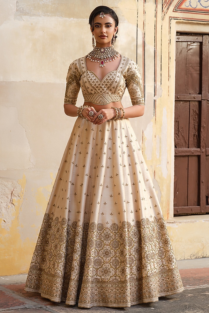 Ivory Raw Silk Zardosi Embellished Bridal Lehenga Set by AMRIN KHAN at Pernia's Pop Up Shop