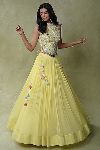 Bright Lemon Yellow Raw Silk Tasseled Flared Lehenga Set by AMRIN KHAN