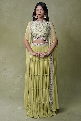 Lemon Yellow Raw Silk Cape Tiered Lehenga Set by AMRIN KHAN