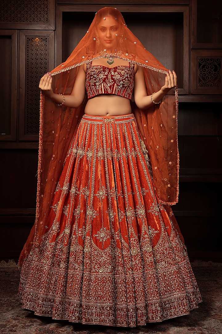 Orange Velvet Zardosi Embroidered Bridal Lehenga Set
by AMRIN KHAN at Pernia's Pop Up Shop