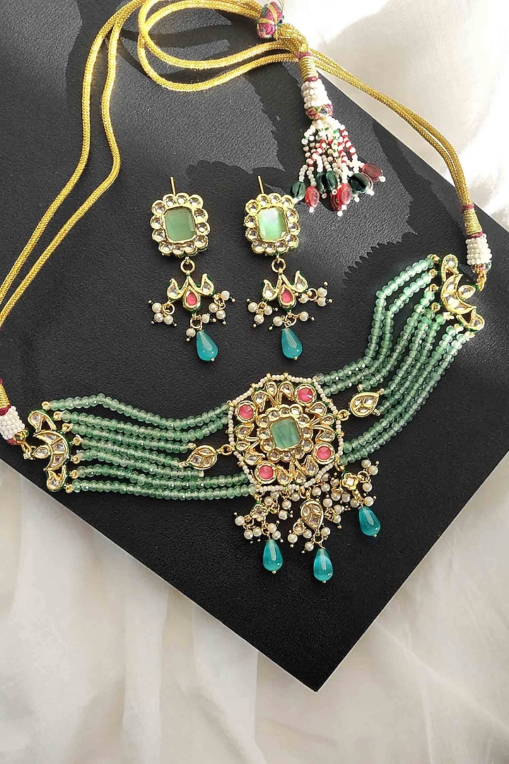 Gold Finish Kundan Polki & Green Stone Choker Necklace Set by Amreli Jaipur at Pernia's Pop Up Shop