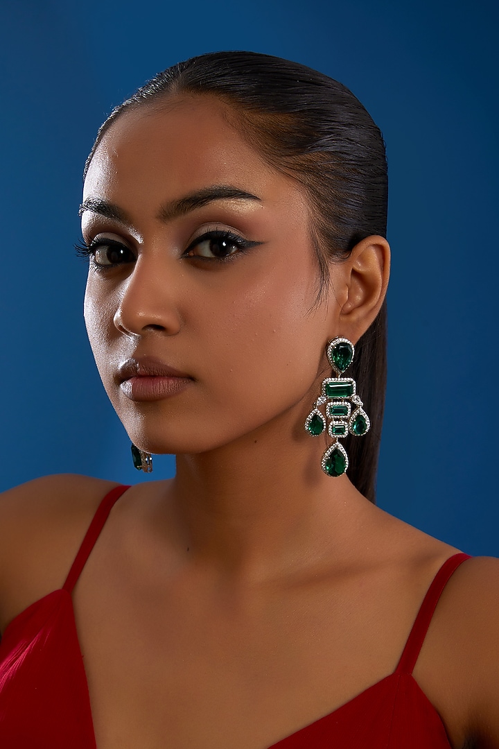 White Finish Zircon & Emerald Dangler Earrings by Amreli Jaipur at Pernia's Pop Up Shop