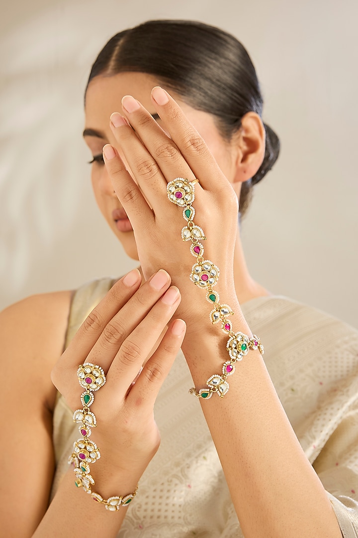 Gold Finish Kundan Polki & Floral Motifs Hand Harness (Set Of 2) by Amreli Jaipur at Pernia's Pop Up Shop