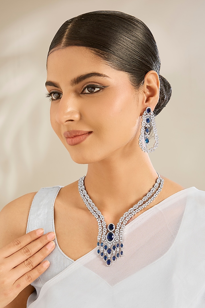 White Gold Finish Cubic Zirconia & Blue Stone Necklace Set by Amreli Jaipur at Pernia's Pop Up Shop