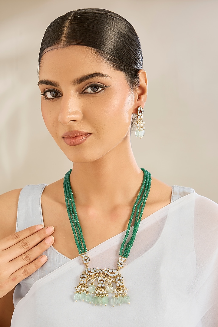 Gold Finish Green Kundan Polki & Mother Of Pearl Necklace Set by Amreli Jaipur at Pernia's Pop Up Shop