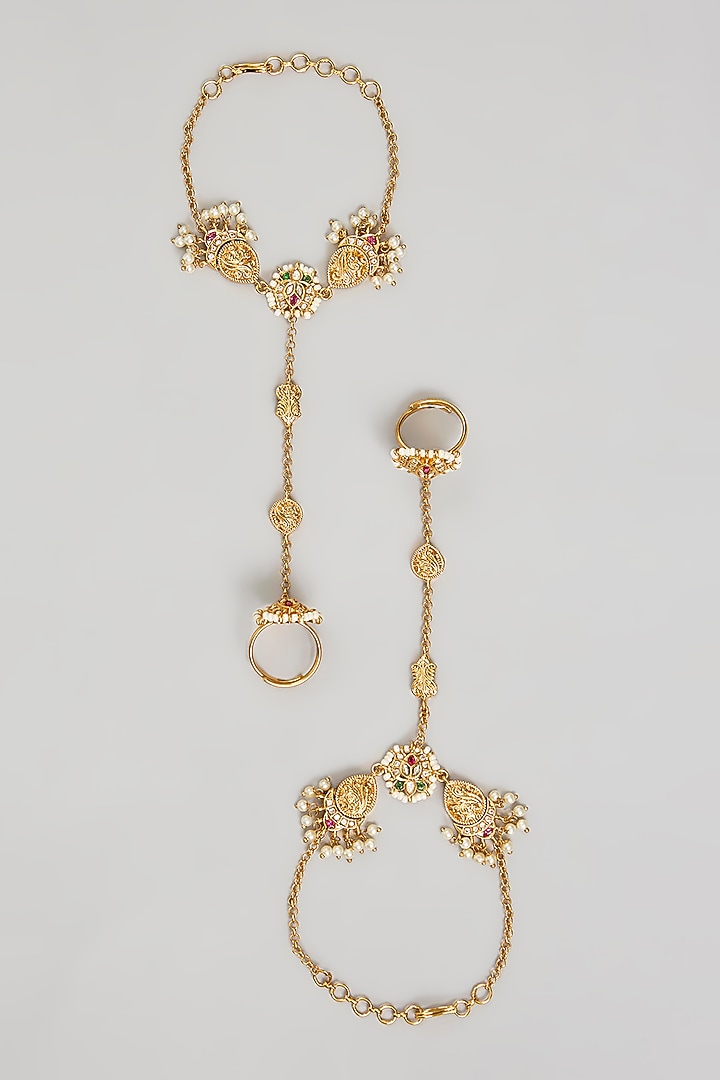 Gold Finish Floral Motifs & Kundan Polki Hand Harness (Set Of 2) by Amreli Jaipur at Pernia's Pop Up Shop