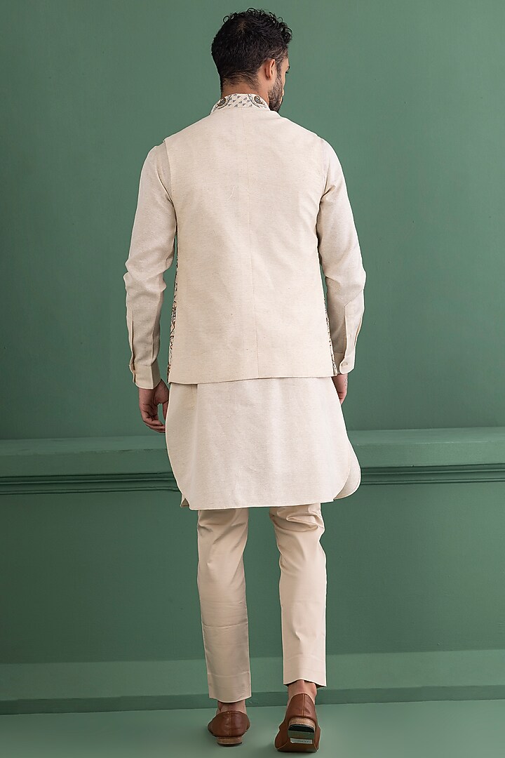 Cream Tussar Silk Embroidered Bundi Jacket Set by AMIT ARORA at Pernia's Pop Up Shop