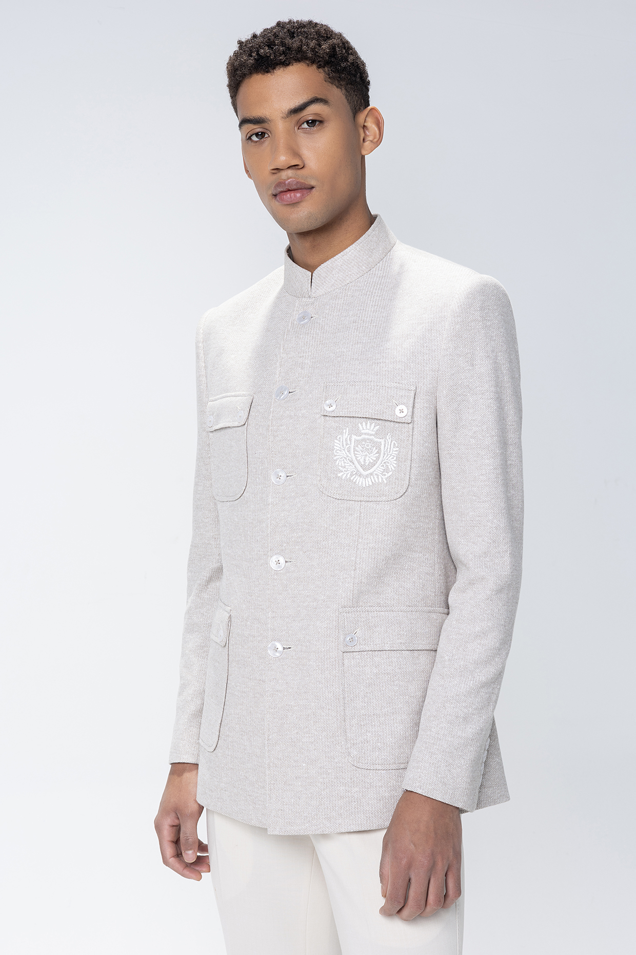 Fawn Knit Motif Embroidered Textured Bandhgala by AMIT ARORA