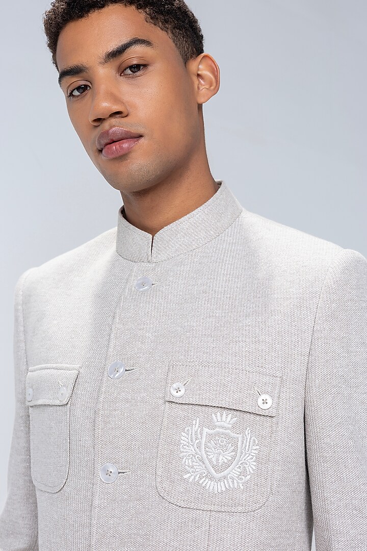 Fawn Knit Motif Embroidered Textured Wedding Bandhgala by AMIT ARORA at Pernia's Pop Up Shop