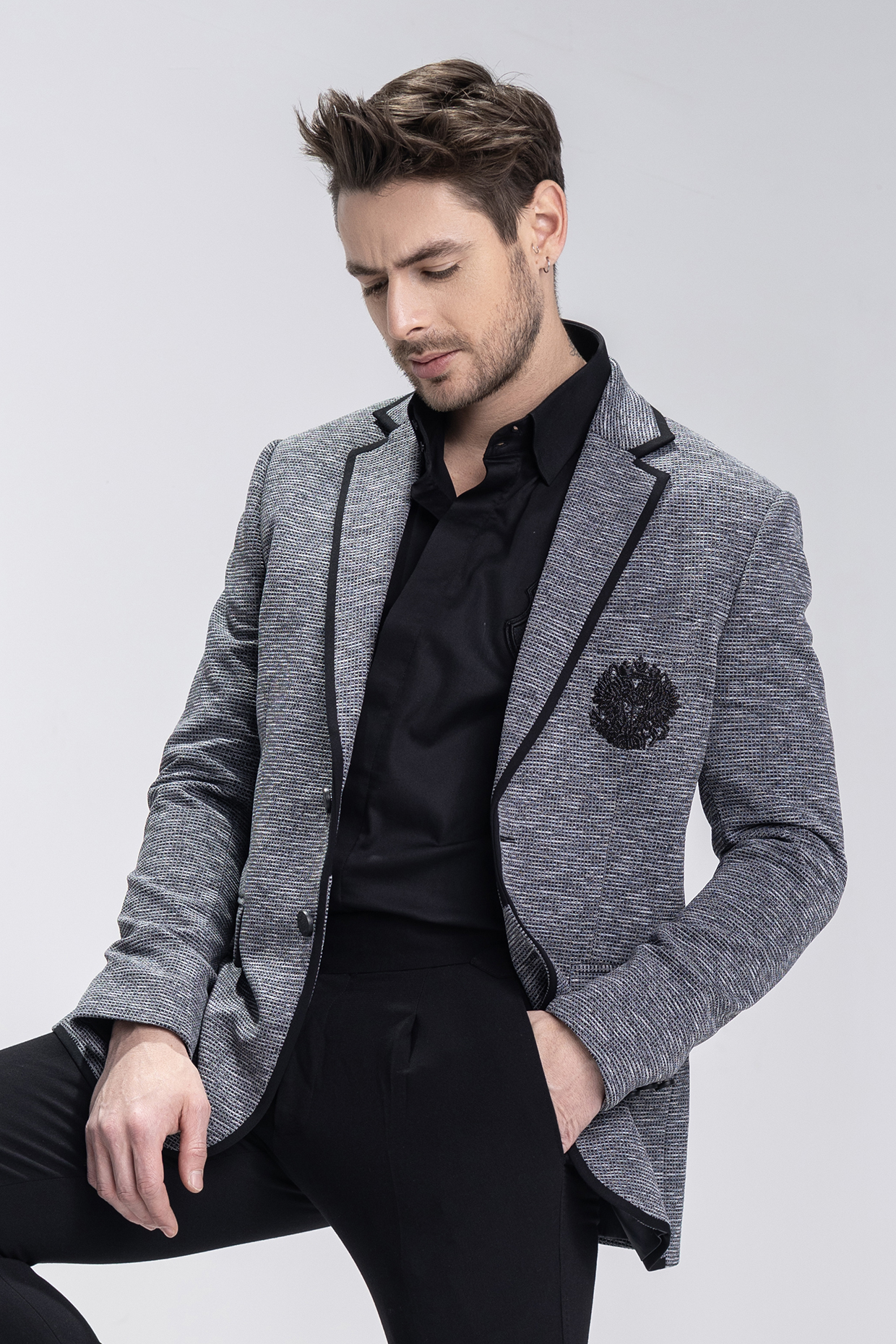 Grey Knit Motif Embroidered Textured Blazer by AMIT ARORA