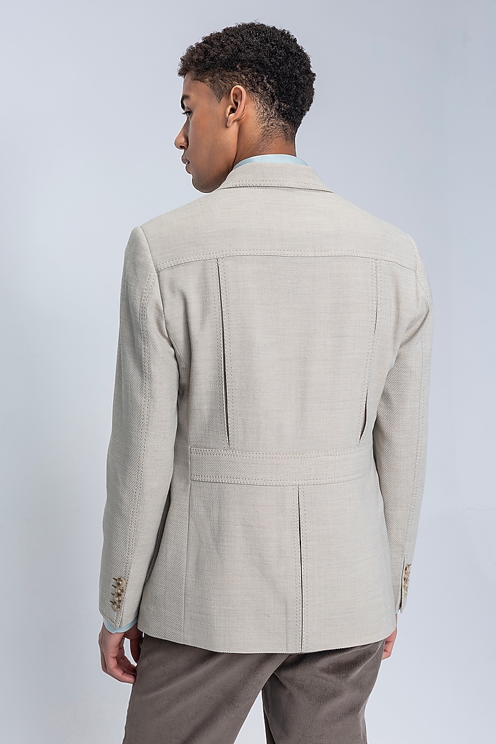 Beige Knit Textured Blazer by AMIT ARORA at Pernia's Pop Up Shop