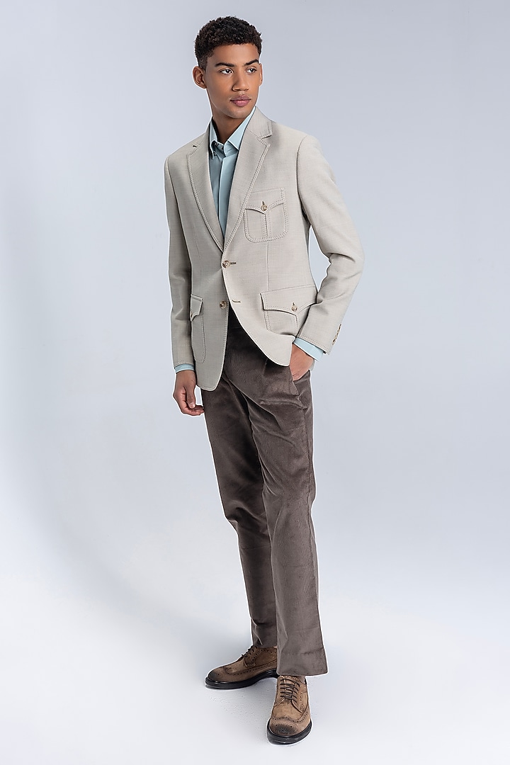 Beige Knit Textured Blazer by AMIT ARORA at Pernia's Pop Up Shop