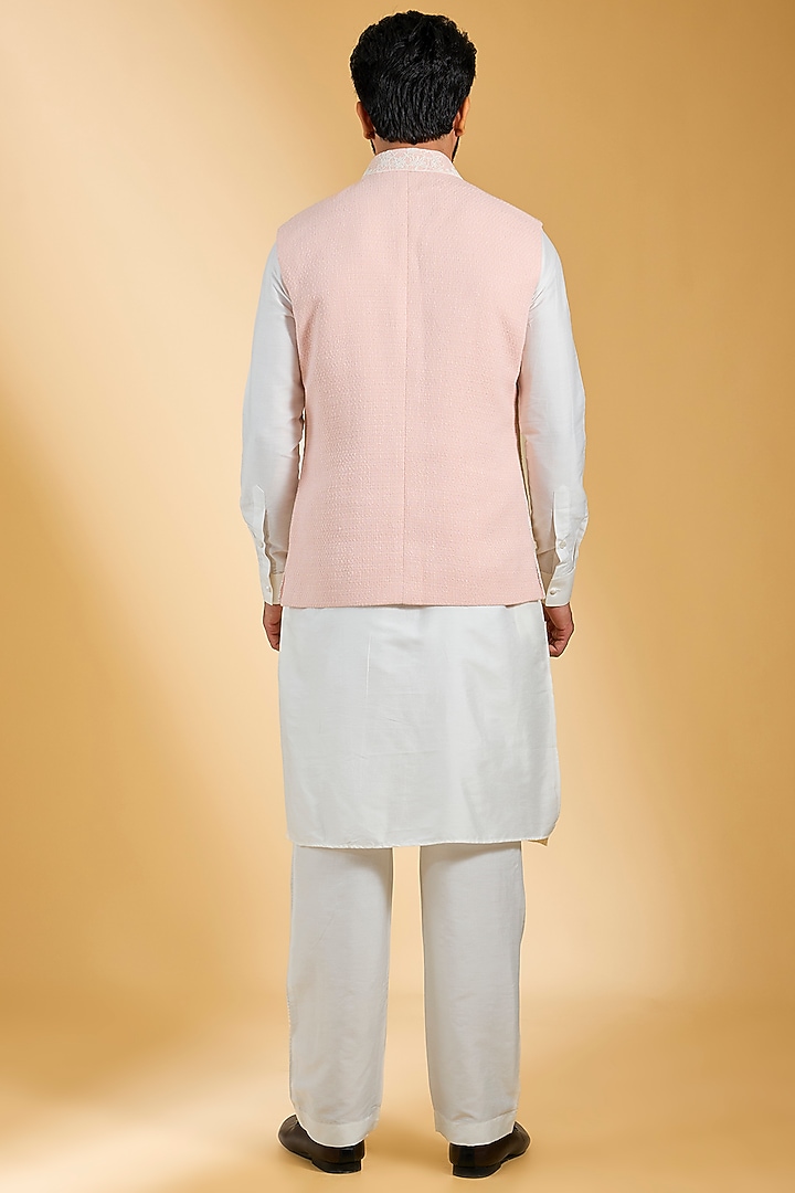 Peach Textured Rayon & Cotton Silk Hand Embroidered Bundi Jacket Set by AMIT ARORA at Pernia's Pop Up Shop