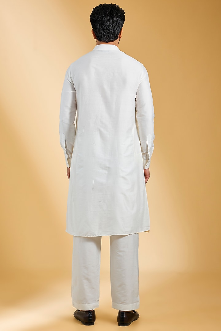 Peach Textured Rayon & Cotton Silk Hand Embroidered Bundi Jacket Set by AMIT ARORA at Pernia's Pop Up Shop