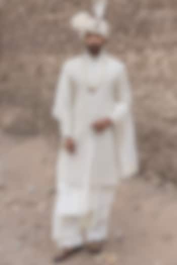 Cream Textured Poly Knit Hand Embroidered Groom Sherwani Set by AMIT ARORA at Pernia's Pop Up Shop