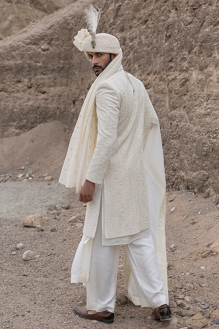 Cream Textured Poly Knit Hand Embroidered Groom Sherwani Set by AMIT ARORA at Pernia's Pop Up Shop
