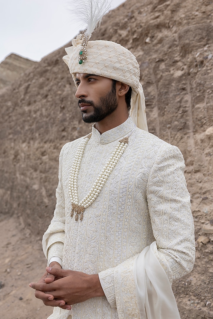 Cream Textured Poly Knit Hand Embroidered Groom Sherwani Set by AMIT ARORA at Pernia's Pop Up Shop
