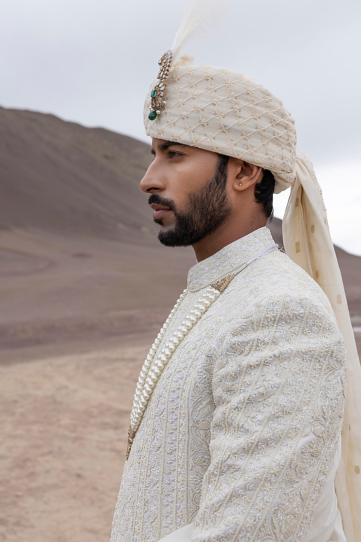 Cream Textured Poly Knit Hand Embroidered Groom Sherwani Set by AMIT ARORA at Pernia's Pop Up Shop