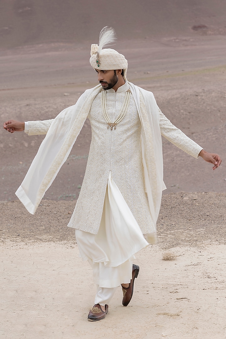 Cream Textured Poly Knit Hand Embroidered Groom Sherwani Set by AMIT ARORA at Pernia's Pop Up Shop