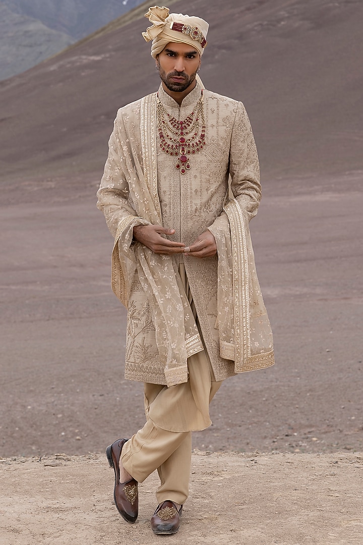 Gold Raw Silk Hand Embroidered Groom Sherwani Set by AMIT ARORA at Pernia's Pop Up Shop