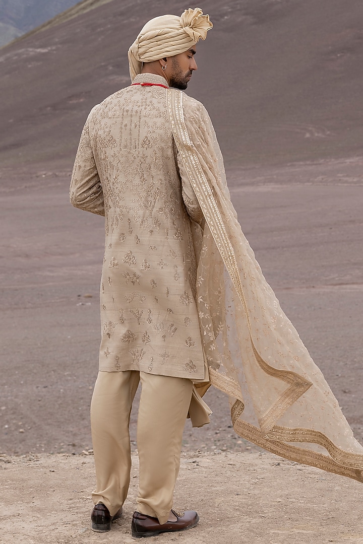 Gold Raw Silk Hand Embroidered Groom Sherwani Set by AMIT ARORA at Pernia's Pop Up Shop