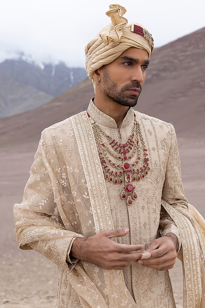 Gold Raw Silk Hand Embroidered Groom Sherwani Set by AMIT ARORA at Pernia's Pop Up Shop