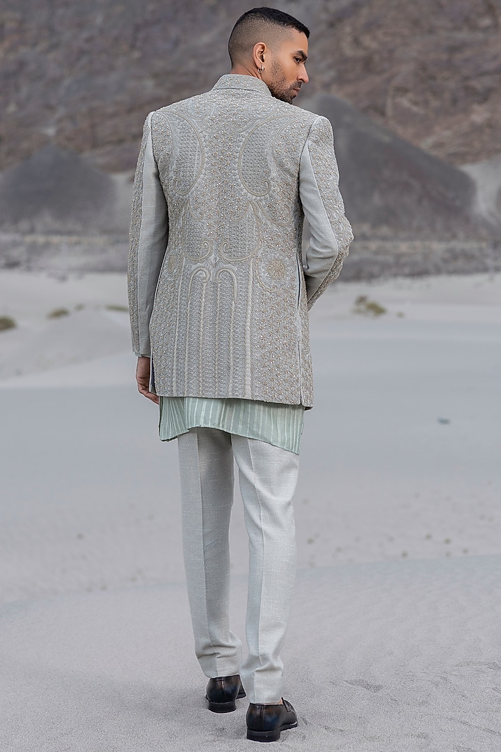 Mint Green Textured Poly Knit Embroidered Groom Indowestern Set by AMIT ARORA at Pernia's Pop Up Shop