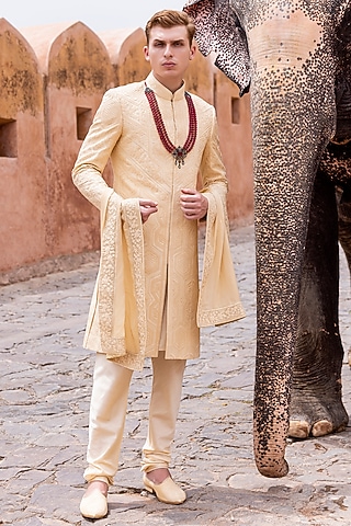 Mustard Raw Silk Hand Embroidered Sherwani Set by AMIT ARORA