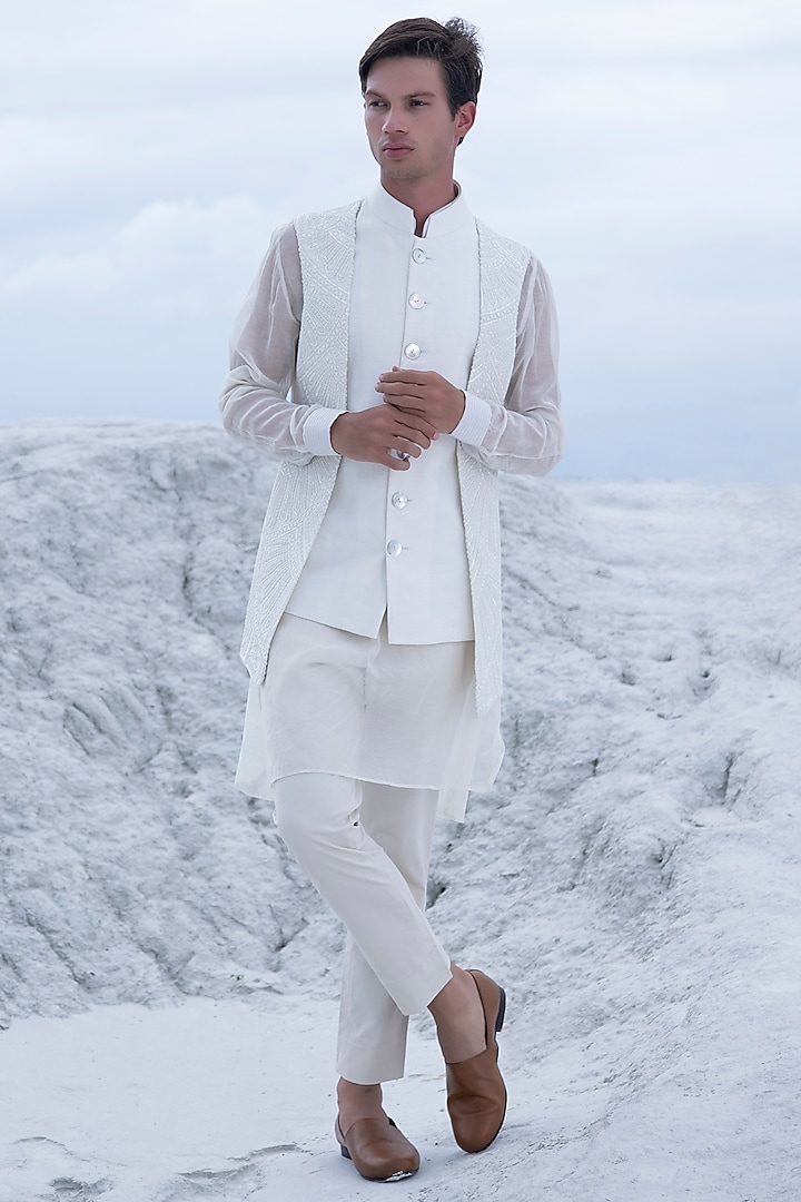 White Pure Silk Cutdana Hand Embroidered Bundi Jacket Set by AMIT ARORA at Pernia's Pop Up Shop