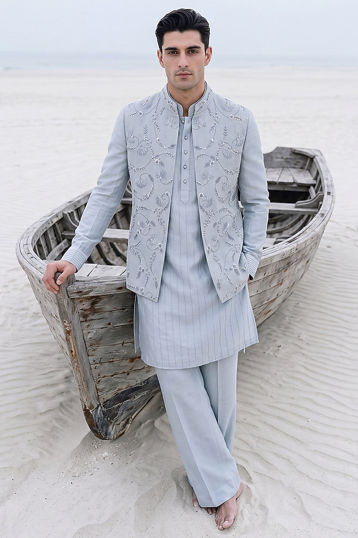 Sky Blue Herringbone Fabric Hand Embroidered Bundi Jacket Set by AMIT ARORA at Pernia's Pop Up Shop