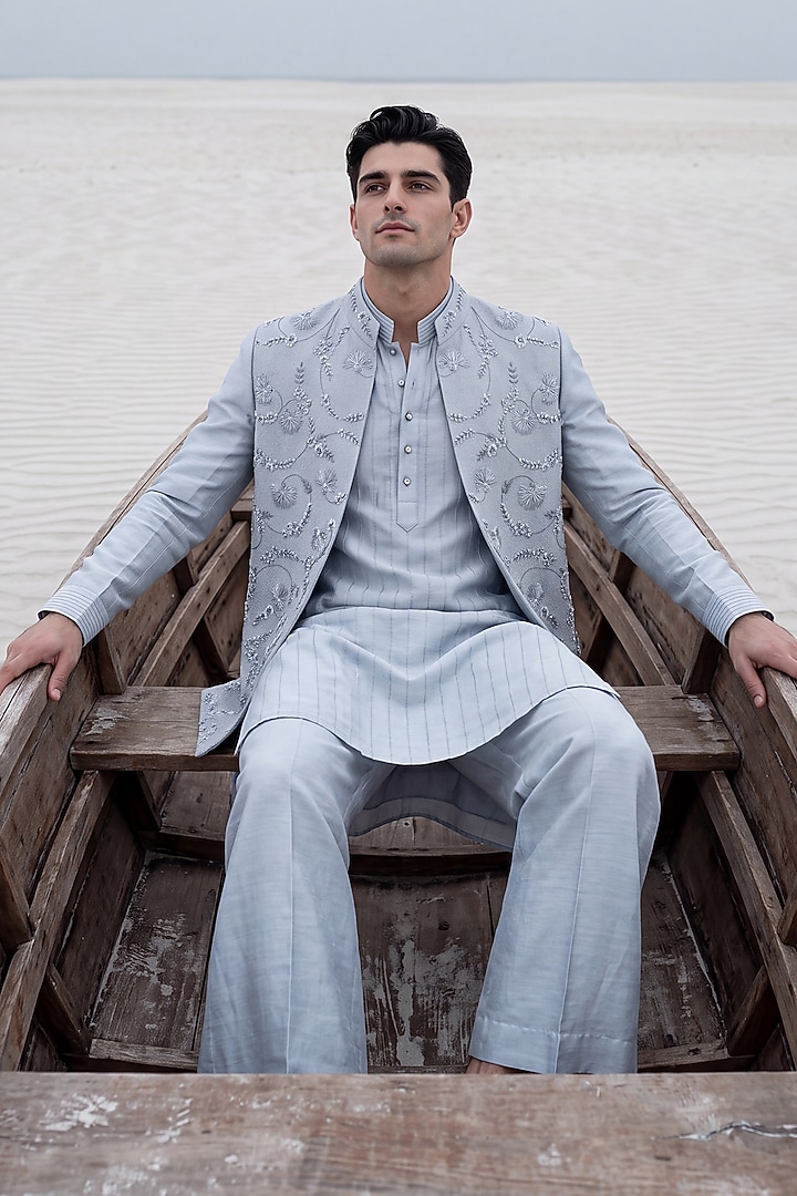 Sky Blue Herringbone Fabric Hand Embroidered Bundi Jacket Set by AMIT ARORA at Pernia's Pop Up Shop