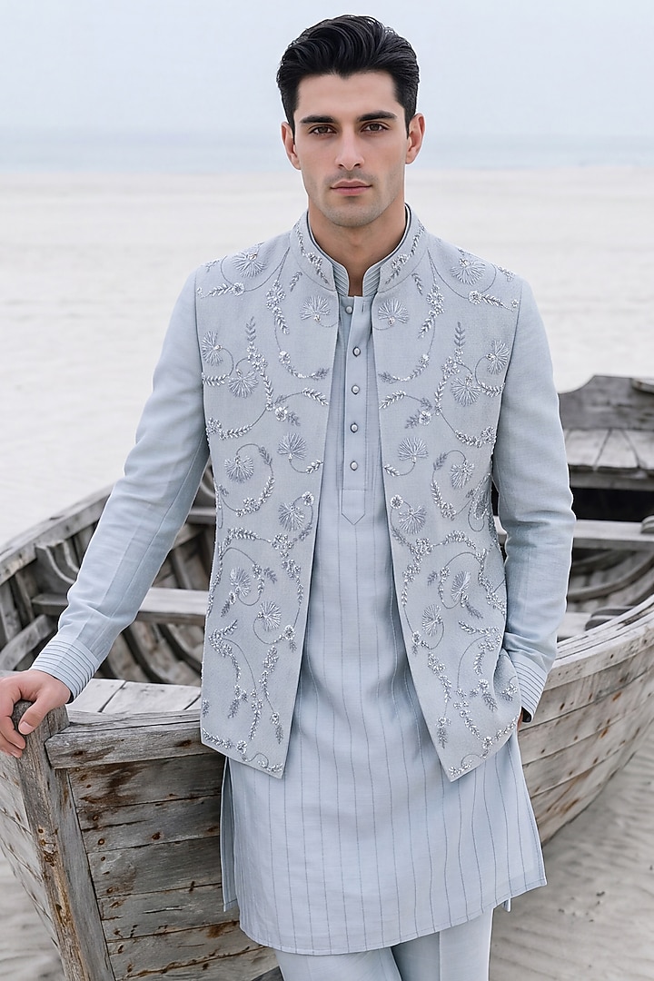 Sky Blue Herringbone Fabric Hand Embroidered Bundi Jacket Set by AMIT ARORA at Pernia's Pop Up Shop