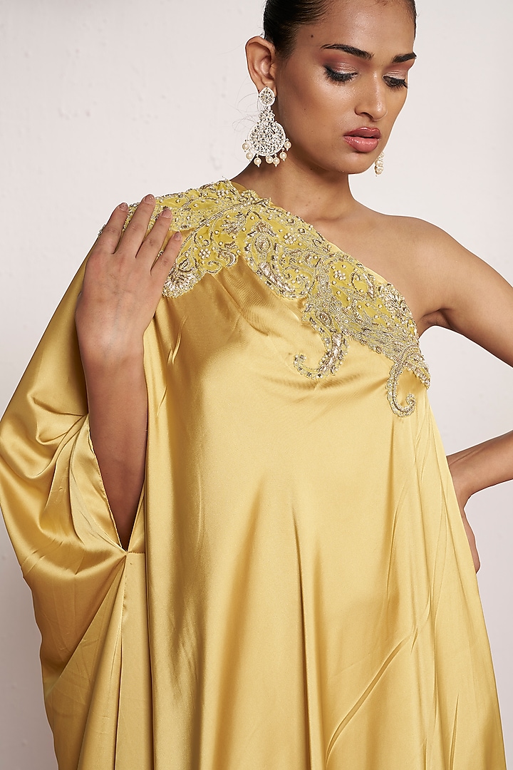 Subtle Yellow Satin One-Shoulder Kaftan by AMRTA By Guneet Kondal at Pernia's Pop Up Shop