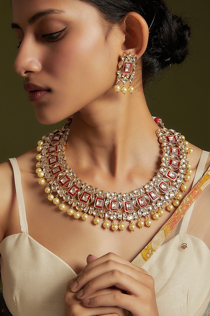 Gold Finish Kundan Polki & Onyx Enamelled Necklace Set In Sterling Silver by AMETHYST