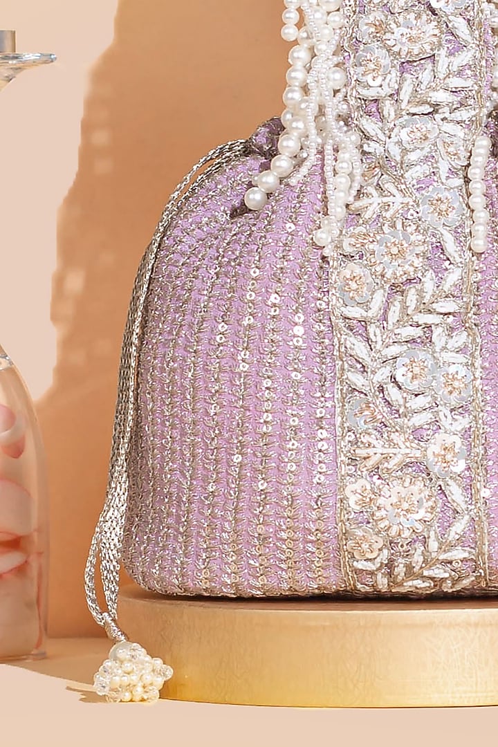 Lilac Georgette & Poly Silk Sequins Embellished Bucket Bag by AMYRA at Pernia's Pop Up Shop